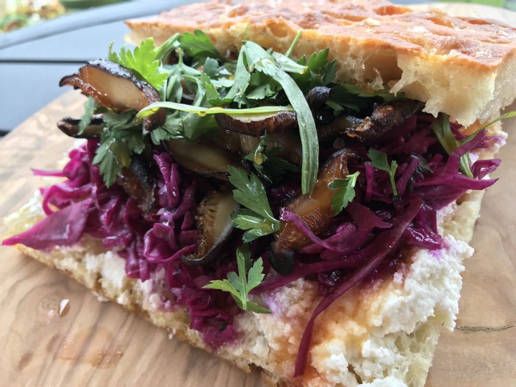 Katama General Store Martha's Vineyard Featured Lunch Sanwich The Shroom - made with shiitake mushrooms from MV Mycological, pickled red cabbage, housemade ricotta, with a drizzle of honey on housemade focaccia