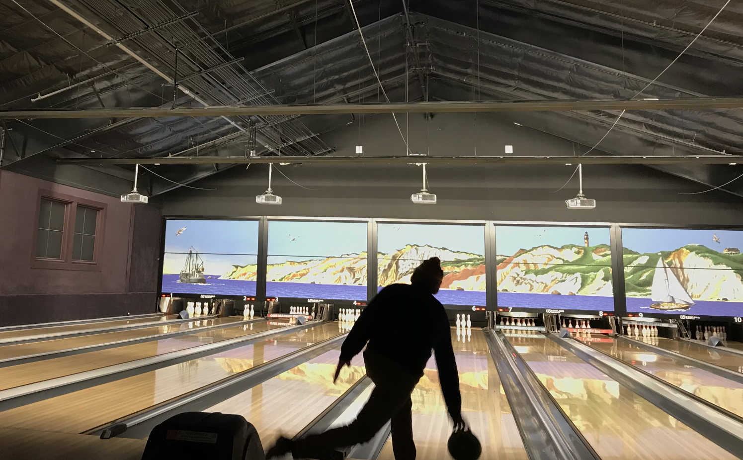 A person bowls at the lanes at the Barn Bowl and Bistro in Oak Bluffs.